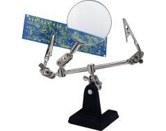 Třetí ruka s lupou