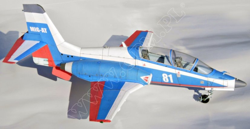 Mig-AT