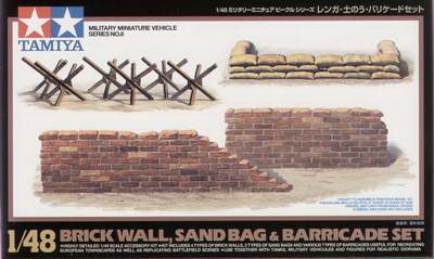 Sada cihel, pytlů s pískem a barikád